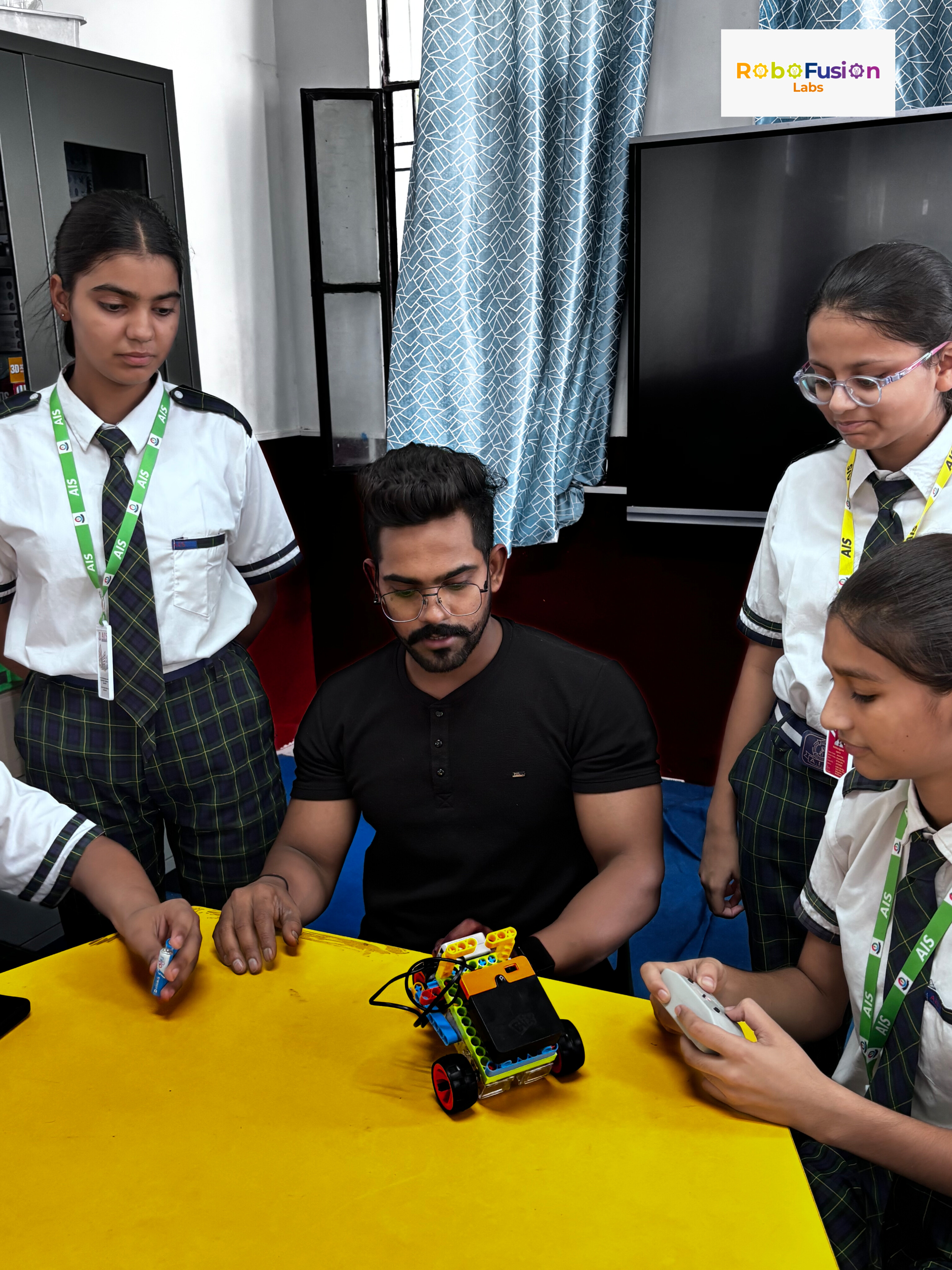 Teacher helping children